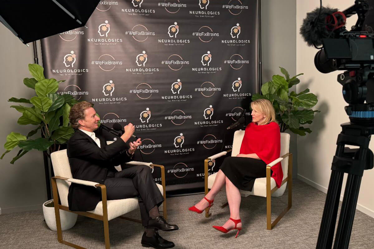 february_newsletter_2026_8 A candid moment shows attendees talking and smiling together during a social event.